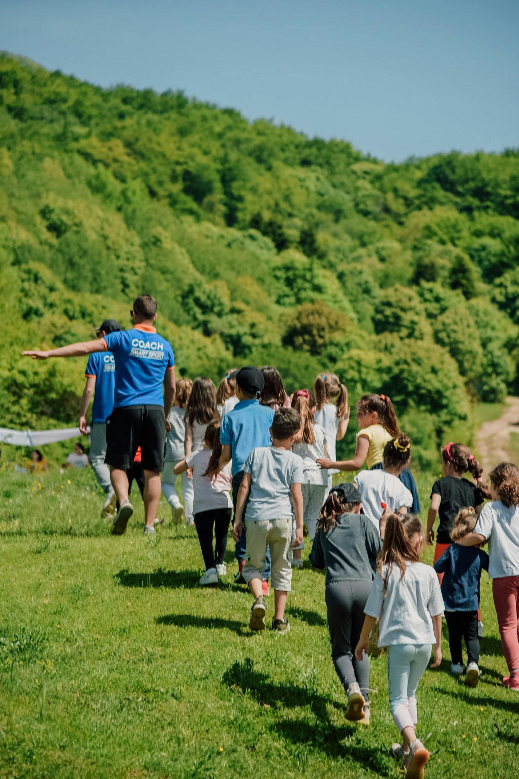 Children being led on a hike
